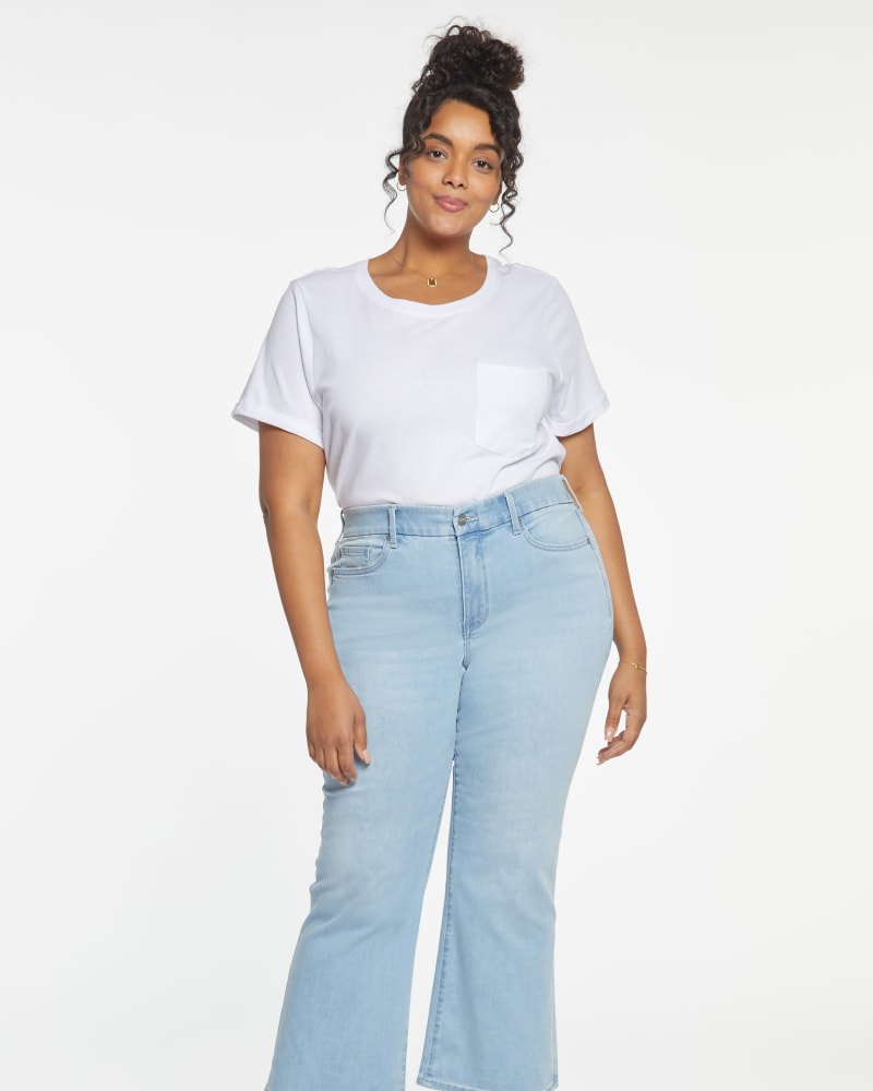 Plus size model wearing Waist Match Relaxed Flare Jean by NYDJ | Dia&Co | dia_product_style_image_id:198035